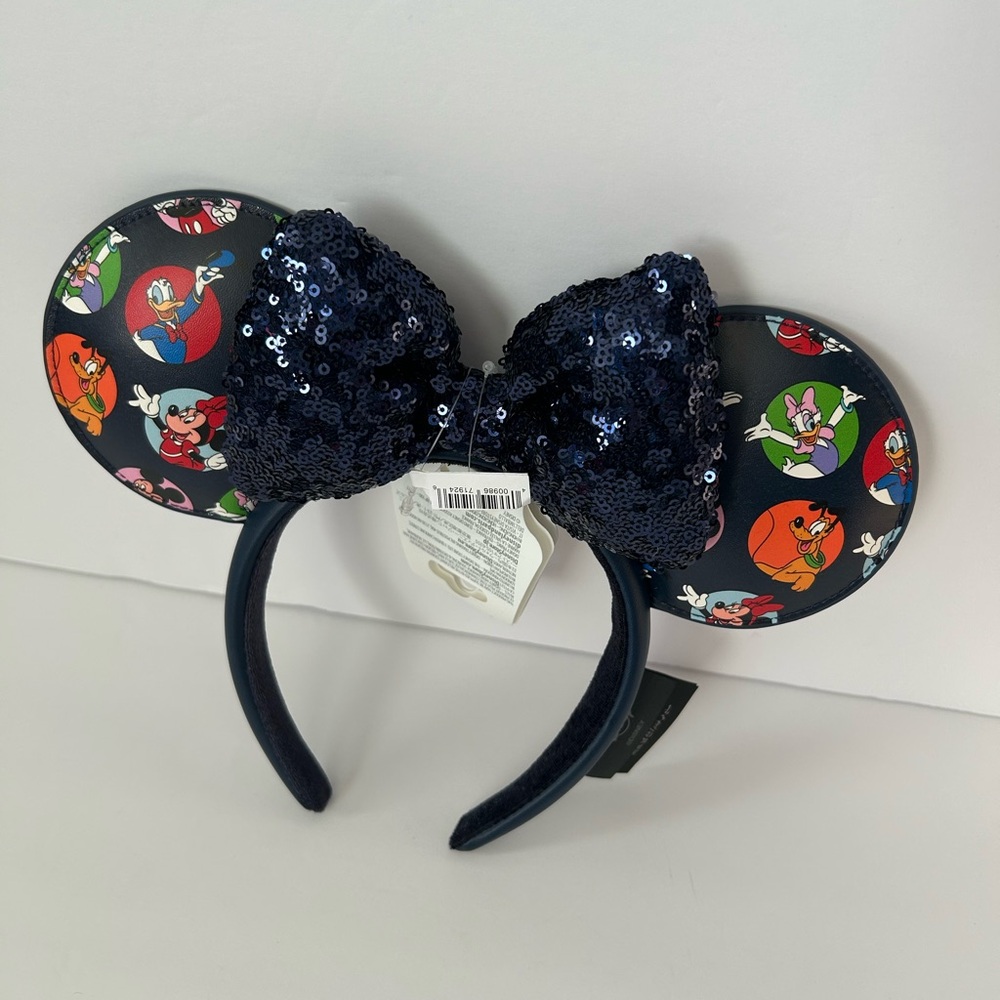 Disney Mickey & friends character ears with a blue sequined bow nwt